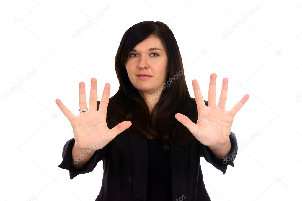 Woman holds up her hands