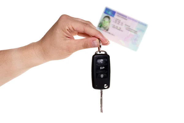 Bilnyckel och tyska körkort Stockbild