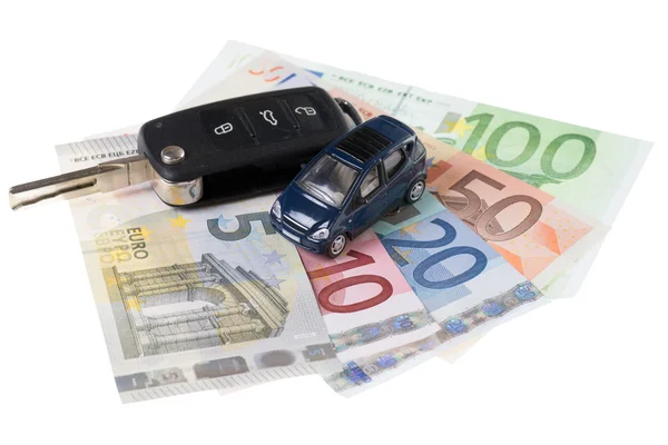 Autosleutel en geld — Stockfoto