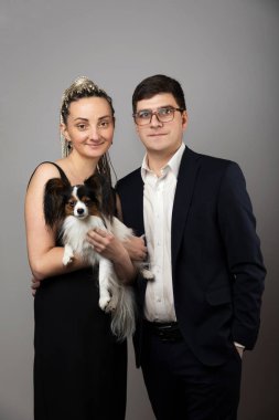 couple love their dog. Petrenthood and Pet owners.