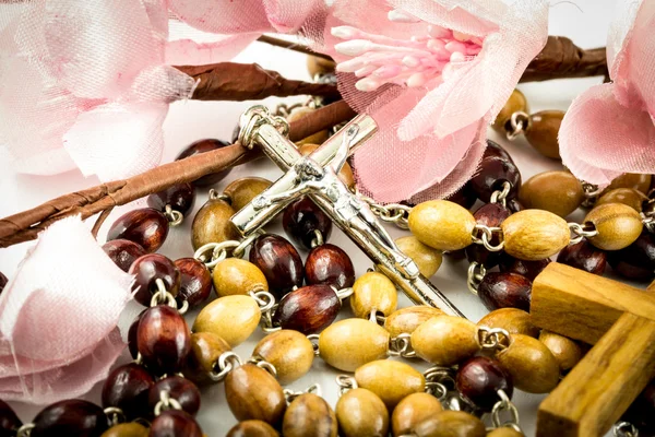 Rosary and peach branch — Stock Photo, Image