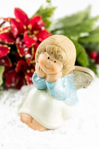 Svatý andělíček s vánoční hvězda — Stock fotografie