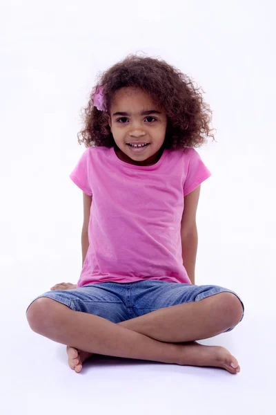 Cross-legged little girl — Stock Photo, Image