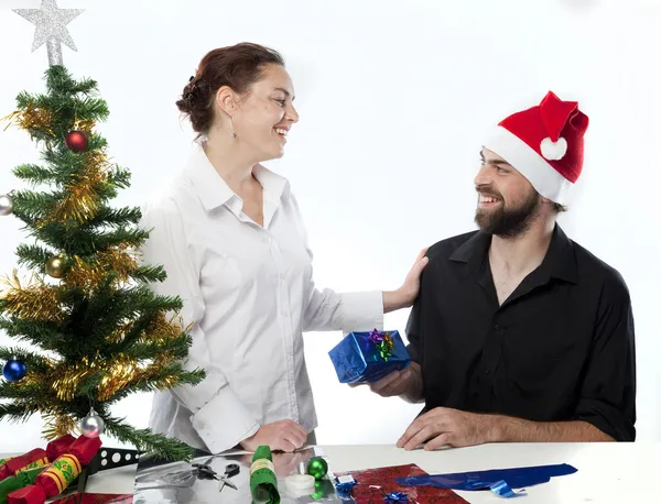 Couple exchanging gifts — Stock Photo, Image