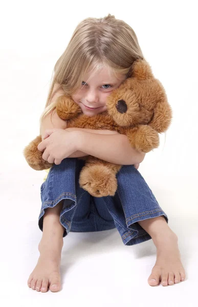 Teddybeer en meisje — Stockfoto