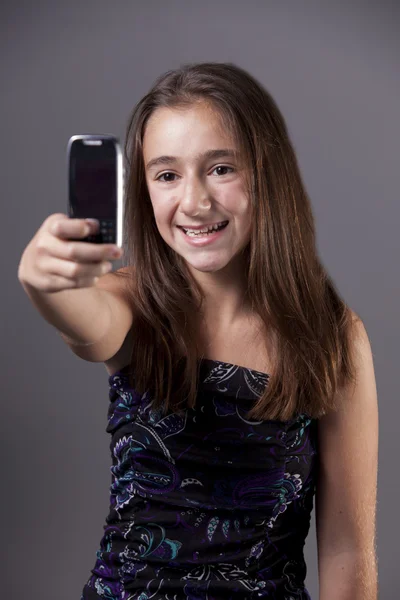 Adolescente y teléfono móvil — Foto de Stock