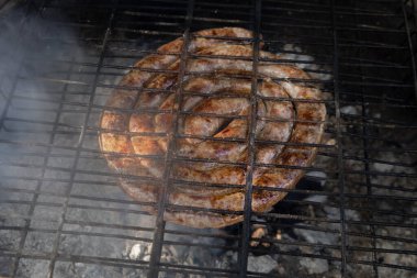 Güney Afrika kuzu sucuğu, Boerewors olarak bilinir, geleneksel Güney Afrika yemek geleneği olan 