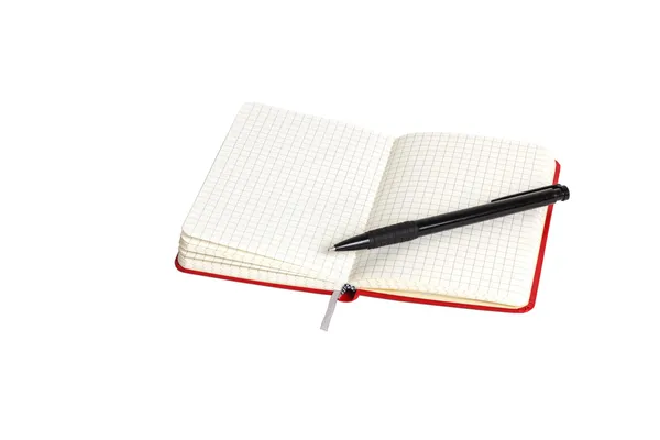 Little red opened notebook with black pen across him — Stock Photo, Image