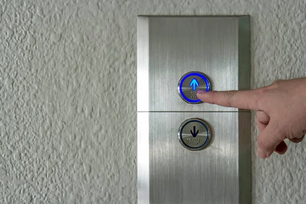 Press the elevator up and keypad elevator