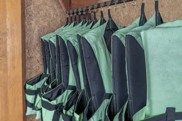 Life jackets in green color for life security in the water.