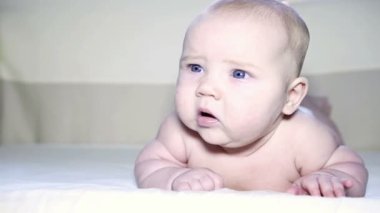 Newborn baby in the child bed