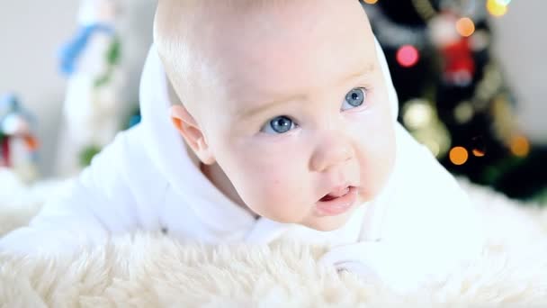 Baby in white on the Christmas and new year background — Stock Video