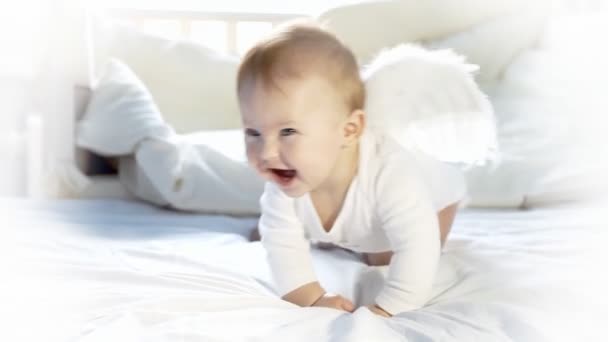 Baby angel on the bed — Stock Video