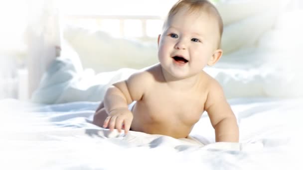 Happy baby on the bed — Stock Video