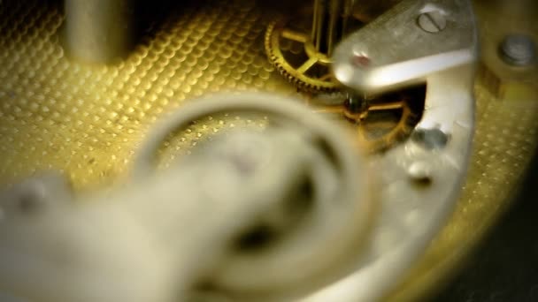 Clockwork watches on the grunge background — Stock Video