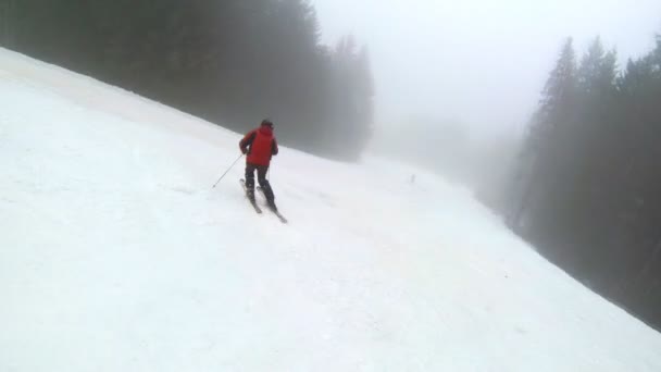 Motion camera view of skier is riding in the mountains — Stock Video