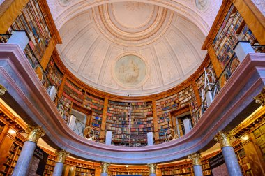 PANNONHALMA, HUNGARY - AUGUST 13, 2021: Interior of the Library of the Pannonhalma Benedictine abbey in Pannonhalma, Hungary clipart