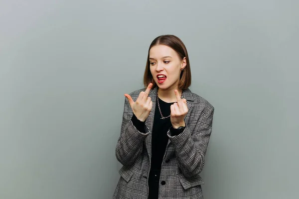 Emotional Attractive Business Woman Jacket Stands Gray Background Shows Gesture — Foto Stock
