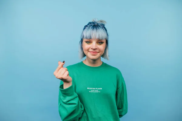 Positive Hipster Girl Colored Hair Stands Blue Background Shows His — ストック写真