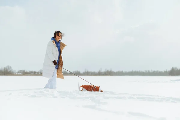 Happy Woman Young Little Dog Leash Walks Snow Covered Frozen — Stockfoto