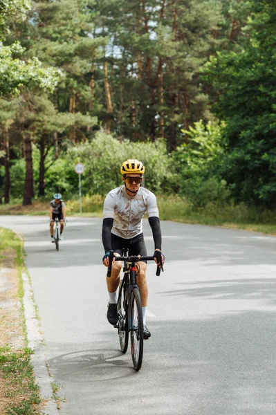 Male Athlete Outfit Rides Bicycle City Asphalt Road — Stockfoto