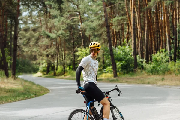 Portrait Handsome Male Professional Cyclist Standing Bicycle Forest Road City — Stockfoto