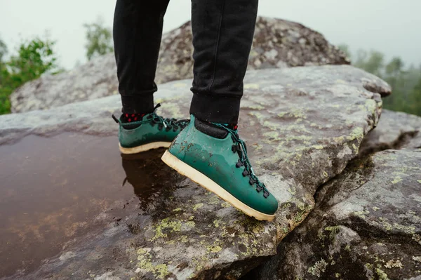 Legs Hiker Man Green Boots Standing Rock Mountains Close Photo — ストック写真