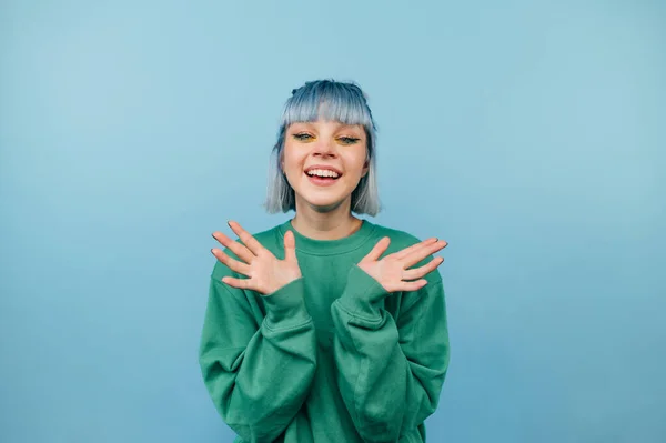 Joyful Girl Colored Hair Stands Blue Background Happy Face Looking — Stock Photo, Image