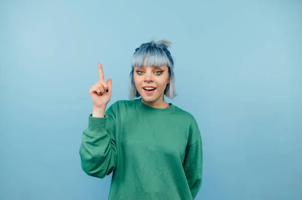 Positive Lady Blue Hair Stands Blue Background Happy Face Looking —  Fotos de Stock