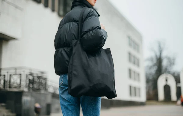 Close Photo Woman Warm Black Jacket Eco Bag Her Hands — Zdjęcie stockowe