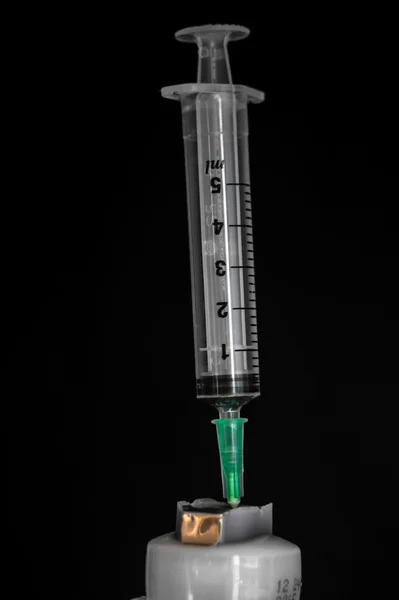 Ležela injekční stříkačka — Stock fotografie