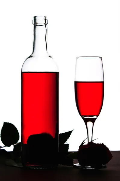 Glass of wine and rose — Stock Photo, Image