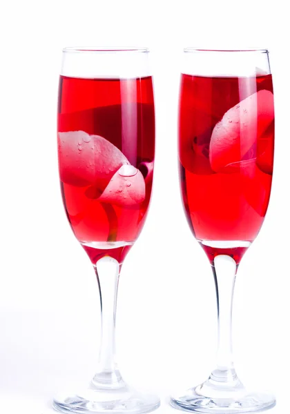 Glass with red wine and an orchid — Stock Photo, Image