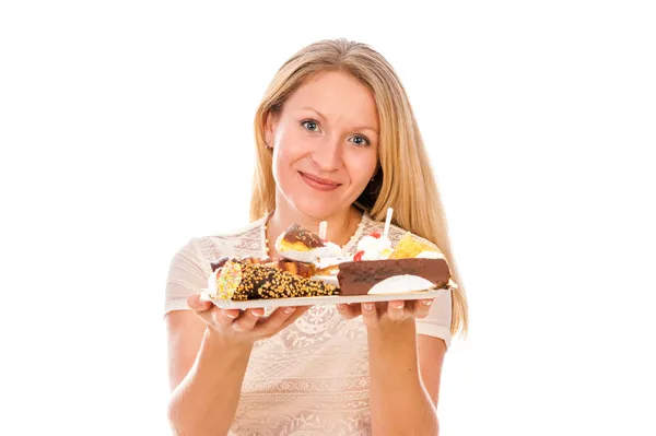 La bella donna con le torte Fotografia Stock