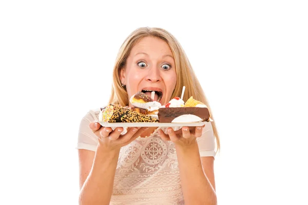 The nice woman with cakes Stock Picture