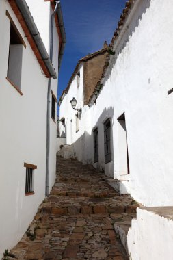 Narrow street in Castellar de la Frontera, Andalusia, Spain clipart