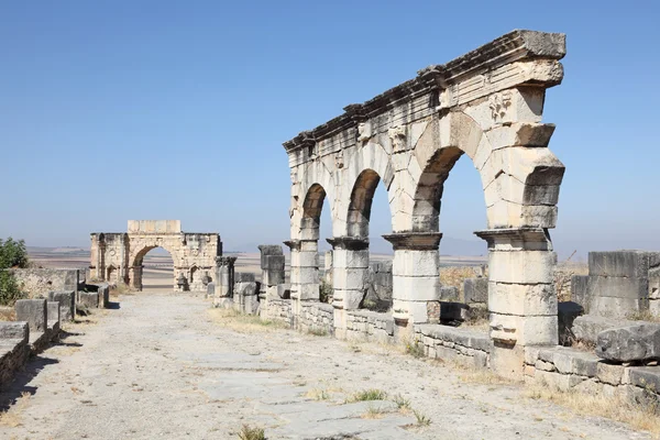 O Arco de Caracala em Volubilis, Marrocos, Norte da África — Fotografia de Stock