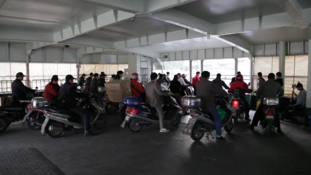 Motorcycle drivers on the ferry in Shanghai — Stock Video