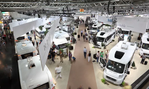 DUSSELDORF - SEPTEMBER 4: Modern Camper vans and caravans presented at the Caravan Salon Exhibition 2013 on September 04, 2013 in Dusseldorf, Germany. — Stock Photo, Image