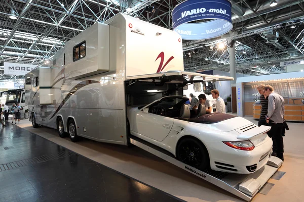 DUSSELDORF - SEPTEMBER 4: Vario Mobil RV with a built in garage at the Caravan Salon Exhibition 2013 on September 04, 2013 in Dusseldorf, Germany — Stock Photo, Image