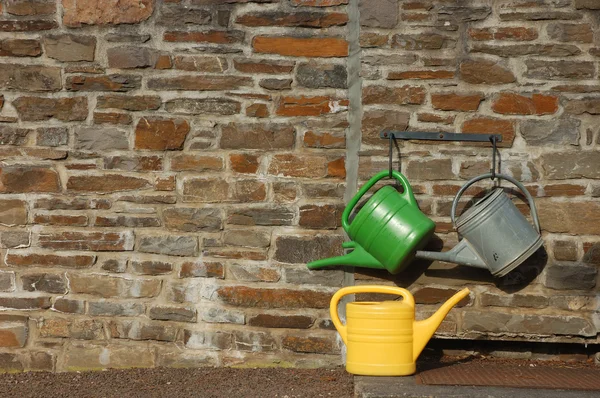 Three watering cans — Stock Photo, Image