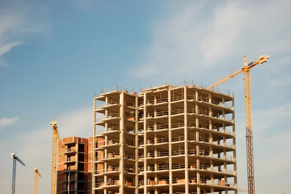 Construction site with cranes — Stock Photo, Image