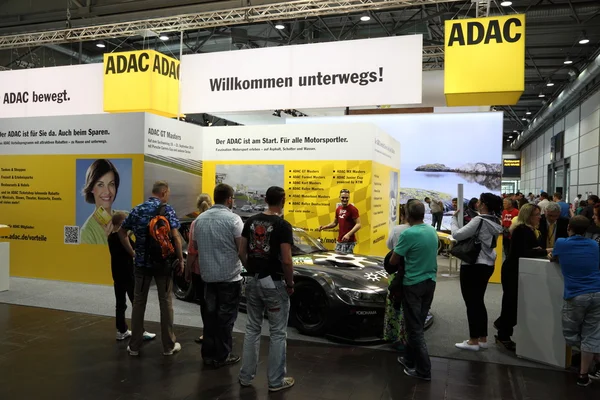 LEIPZIG, GERMANY - JUNE 1: ADAC stand at the AMI - Auto Mobile International Trade Fair on June 1st, 2014 in Leipzig, Germany. ADAC is the biggest german automobile club — Stock Photo, Image