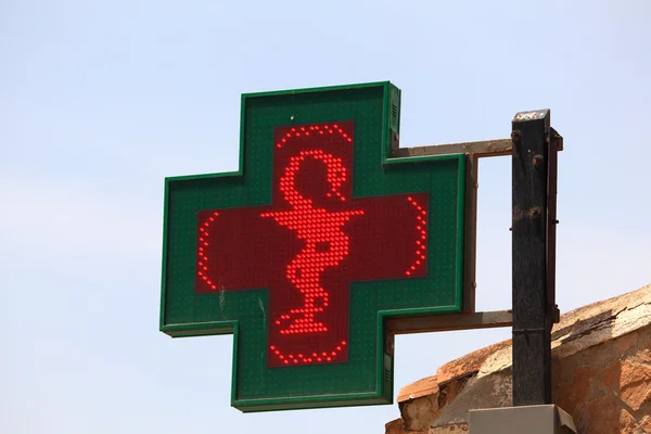 Illuminated pharmacy sign — Stock Photo, Image