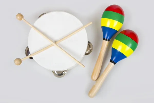 Instrumenty dla dzieci - tamburyn i marakasy — Zdjęcie stockowe