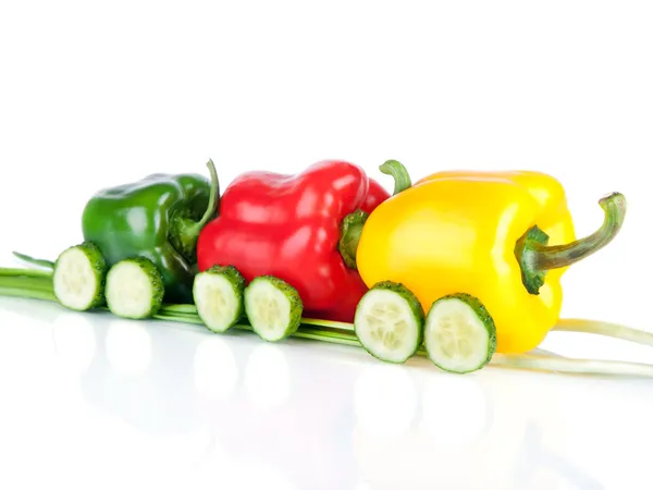 Train made of various sweet pepper vegetables and cucumbers isolated on white background — Stock Photo, Image