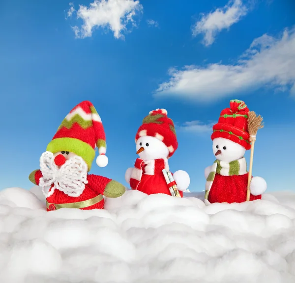 Happy winter snowman friends and santa claus — Stock Photo, Image