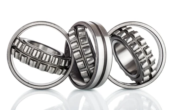 Composition of steel ball roller bearings in closeup isolated on white background — Stock Photo, Image