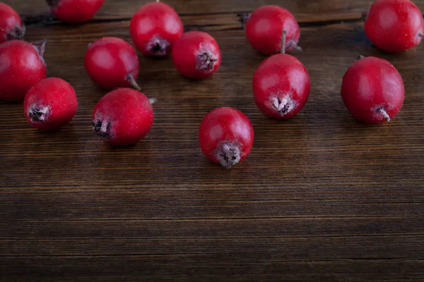 Berry on Wood Background. Texture of tree stump — Stock Photo, Image