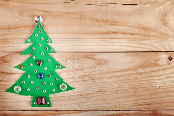 Árbol de Navidad. Decoración de Año Nuevo sobre fondo de madera, con espacio libre para su texto —  Fotos de Stock